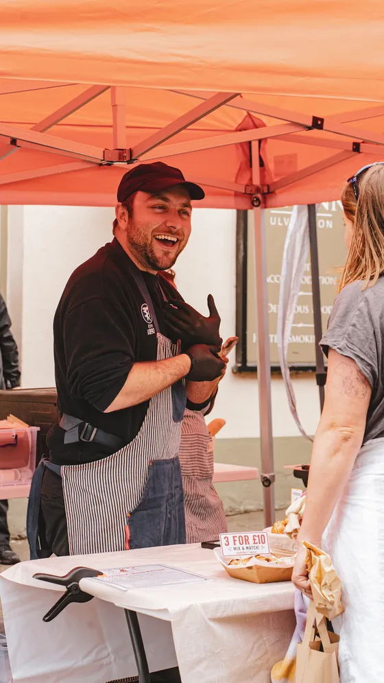 All smiles serving at the La Zorra stall