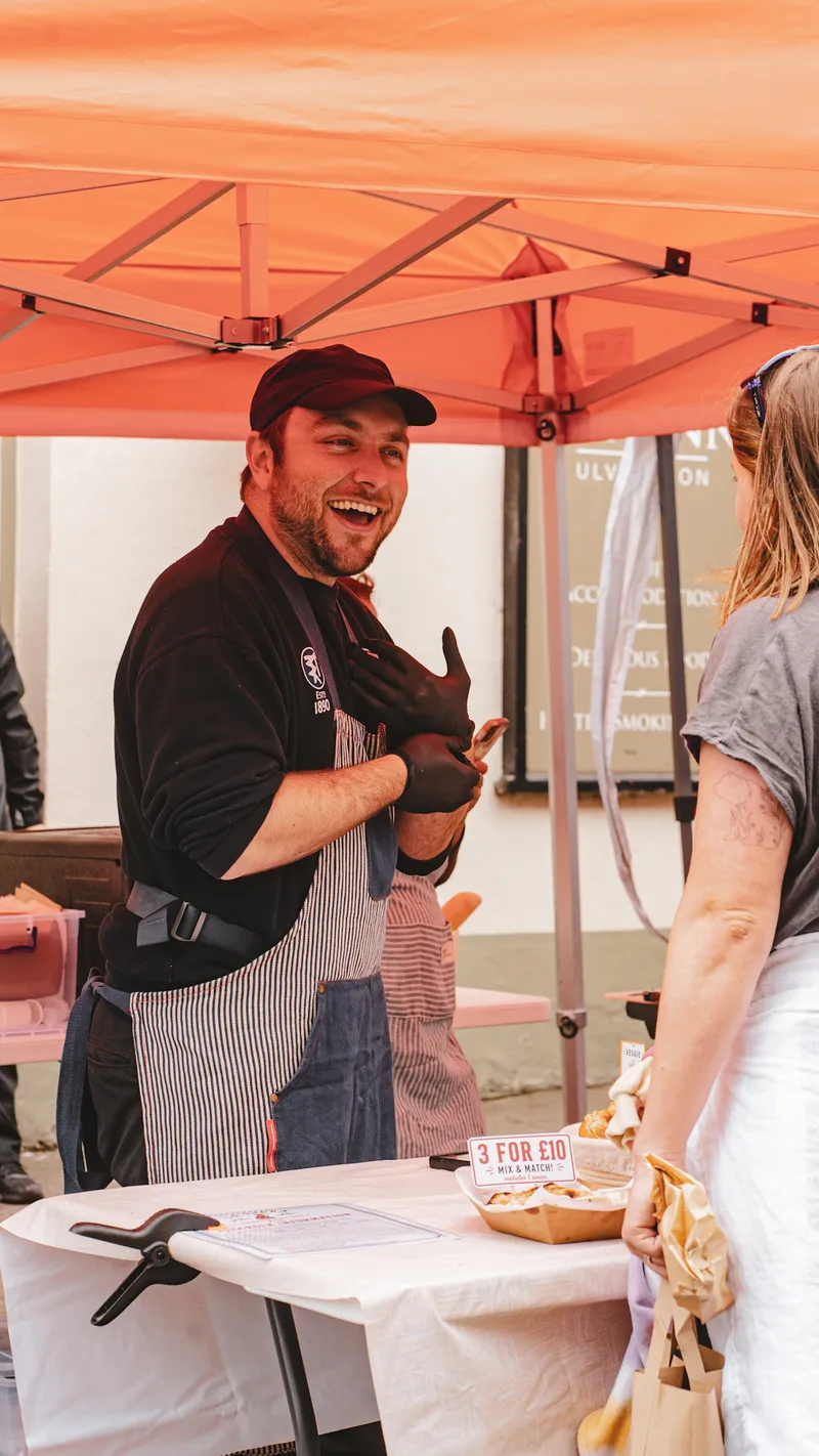 All smiles at the stall — La Zorra